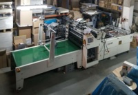 Машина для вклейки окошек в картонные заготовки  XLTC-1020